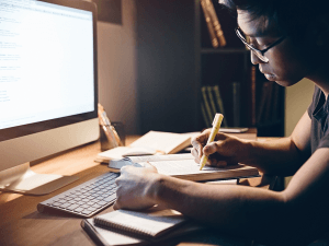 Boosting College Enrollment: The Power of Live Chat and SMS 6 studying with the computer